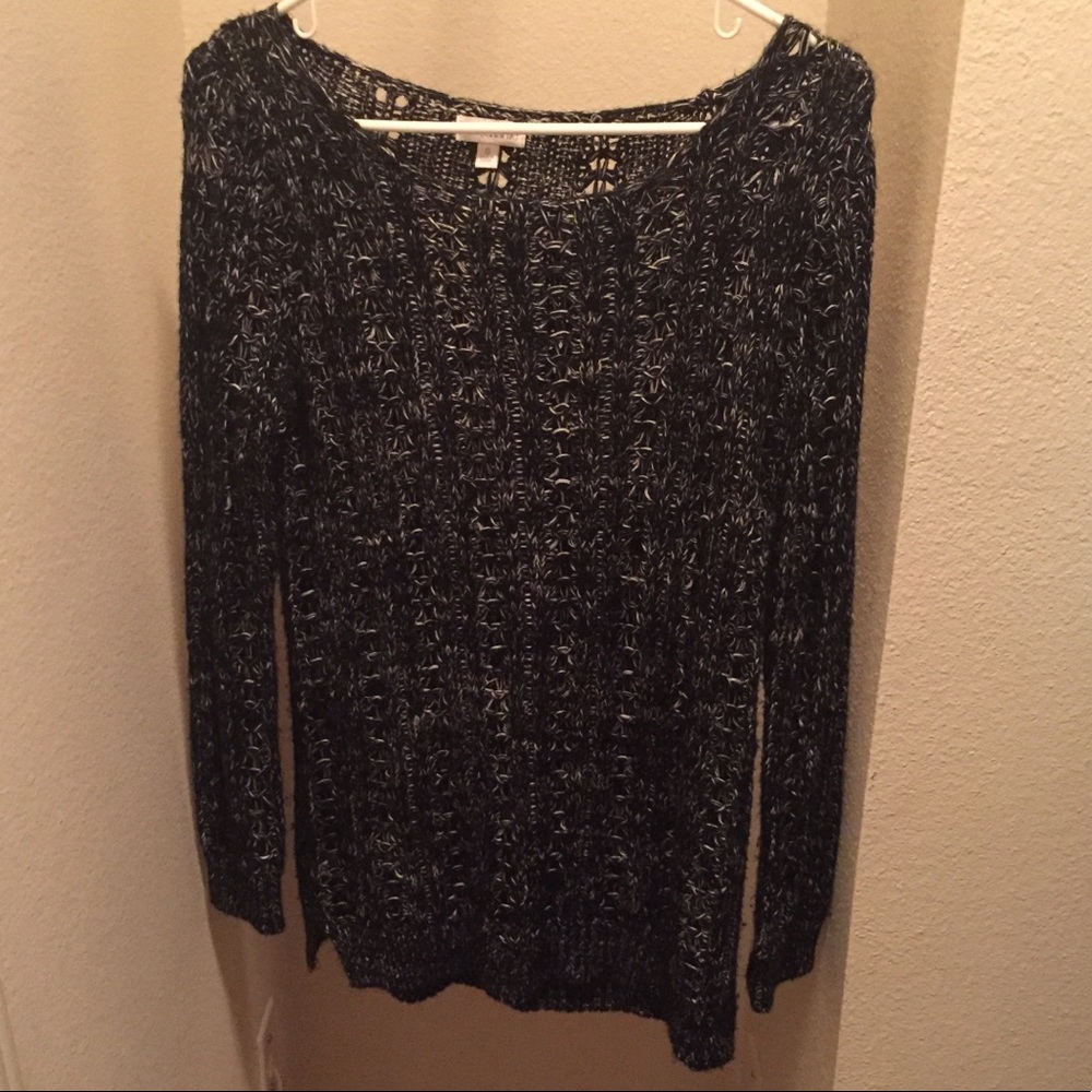 Black sweater with white detailing